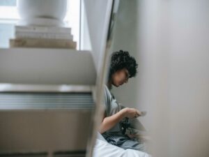 Woman using mobile app for self help